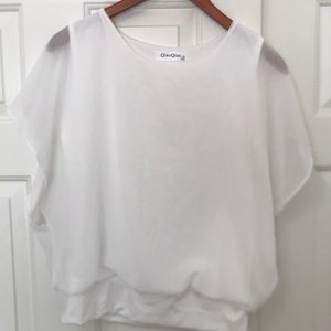 White blouse in size L